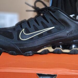 Nike Black Sneakers with Gold Swoosh